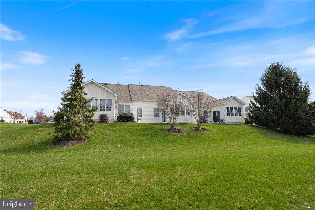 327 Melbourne Way Souderton, PA 18964 - Photo 32 of 44 a house view with a garden space