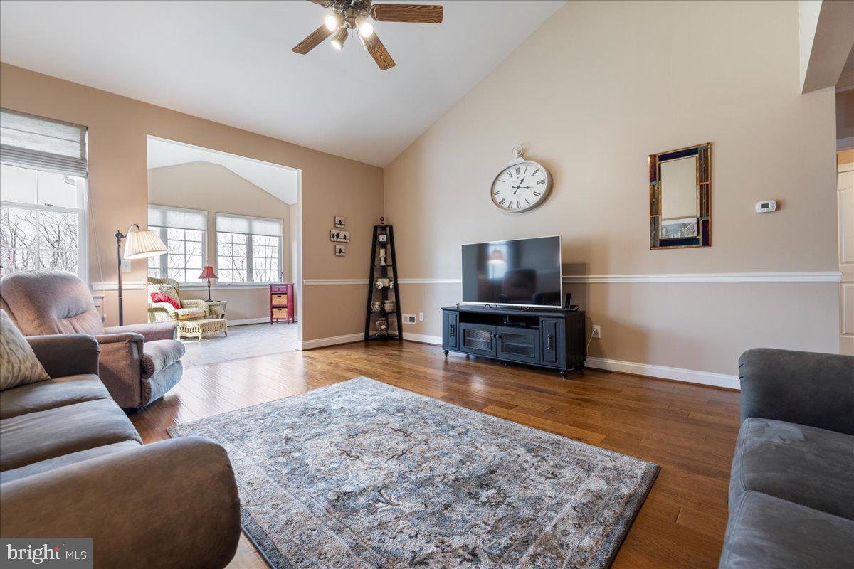 327 Melbourne Way Souderton, PA 18964 - Photo 4 of 44 a living room with furniture and a flat screen tv