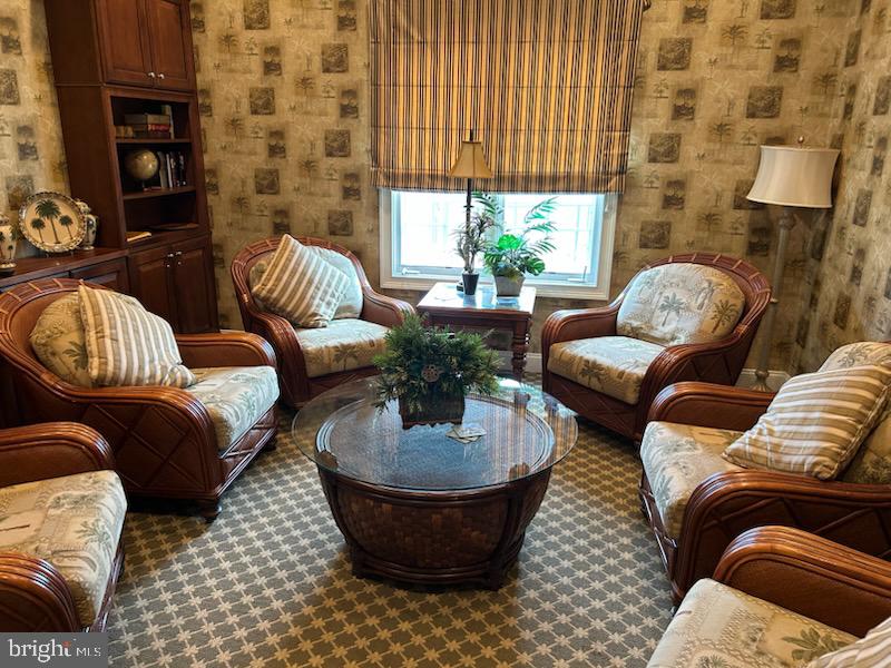 327 Melbourne Way Souderton, PA 18964 - Photo 41 of 44 a living room with furniture and a potted plant