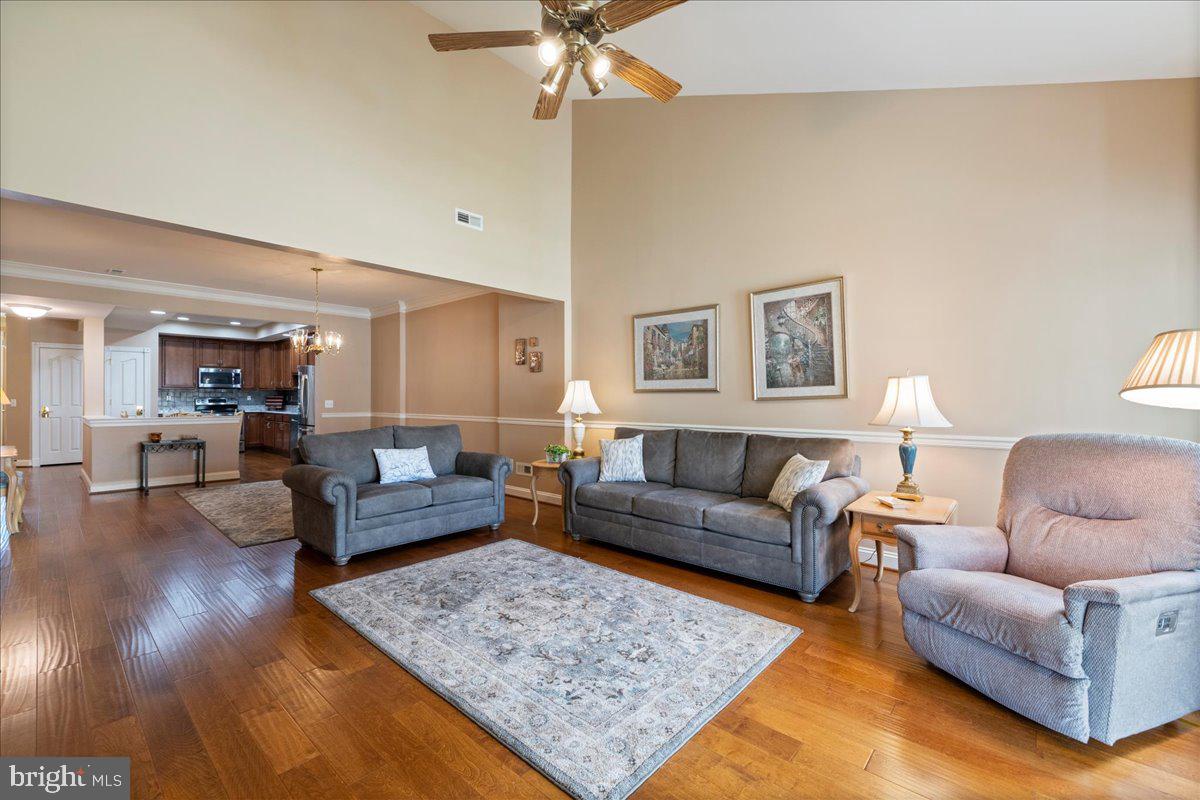 327 Melbourne Way Souderton, PA 18964 - Photo 5 of 44 a living room with furniture and a couch