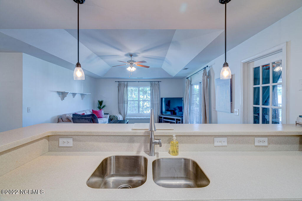 136 Watersfield Road Leland, NC 28451 - Photo 12 of 45 Kitchen bar top overlooking Living room