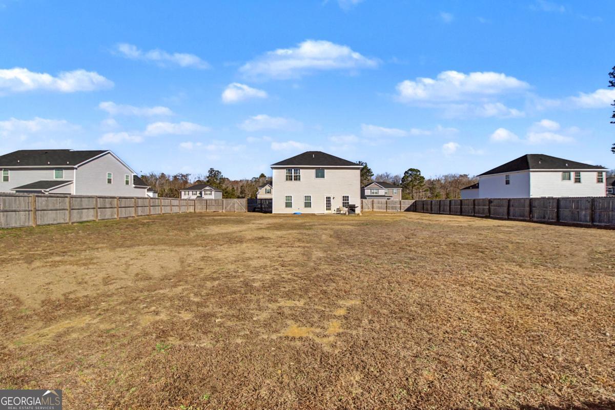 263 Brandonwood Road Northeast Ludowici, GA 31316 - Photo 34 of 34 a view of a lake in front of house