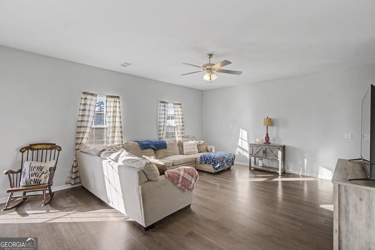 263 Brandonwood Road Northeast Ludowici, GA 31316 - Photo 6 of 34 a living room with furniture