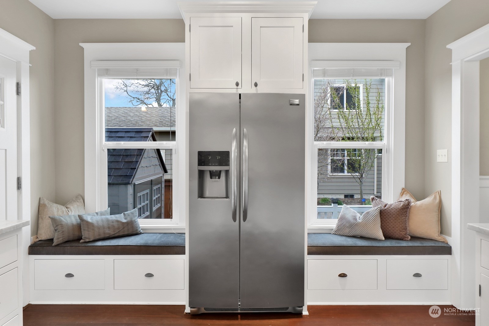 2120 12th Street Anacortes, WA 98221 - Photo 12 of 40 a kitchen with white cabinets and window