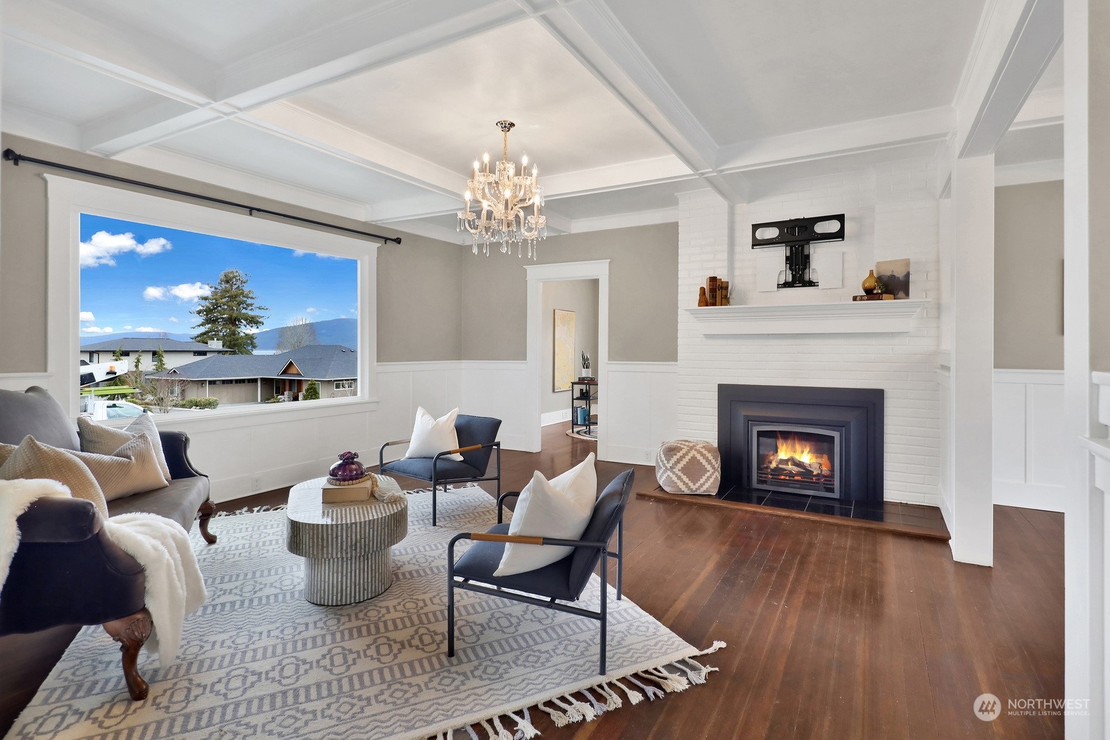2120 12th Street Anacortes, WA 98221 - Photo 2 of 40 a living room with furniture and a fireplace