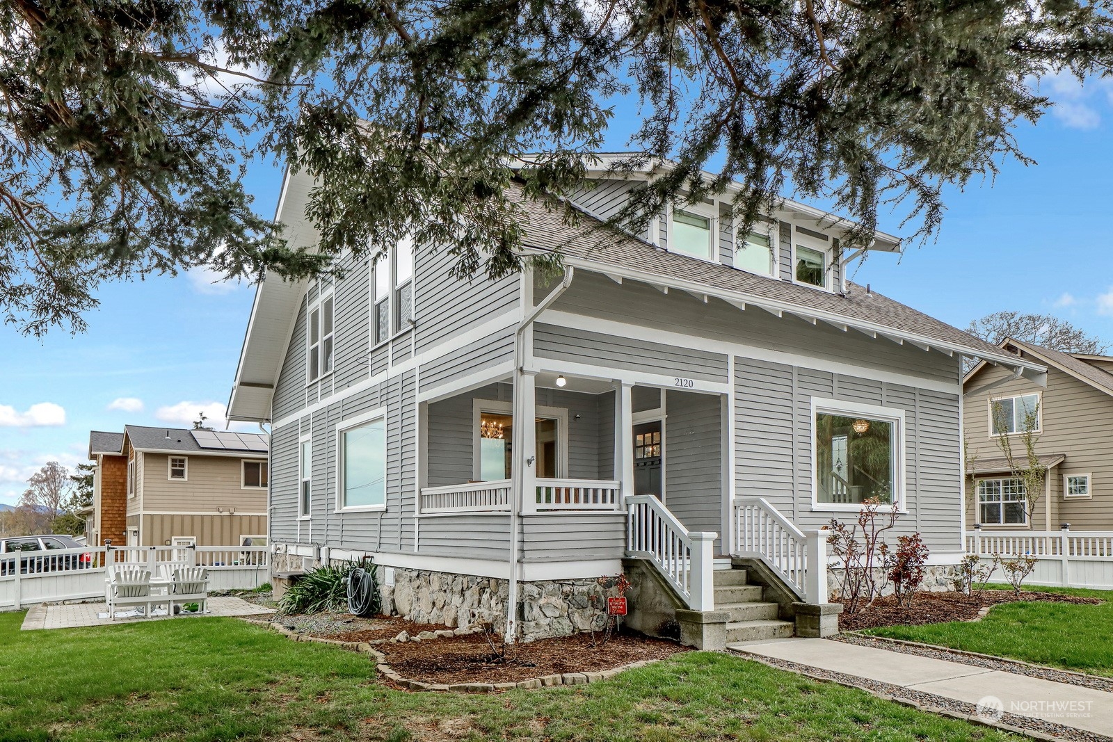 2120 12th Street Anacortes, WA 98221 - Photo 33 of 40 a front view of a house with garden