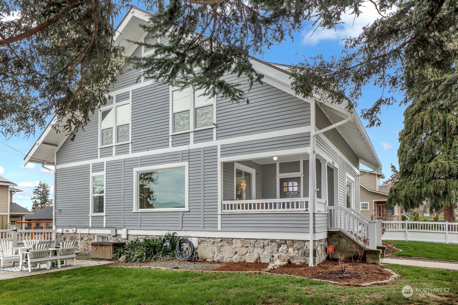 2120 12th Street Anacortes, WA 98221 - Photo 34 of 40 a front view of a house with a yard