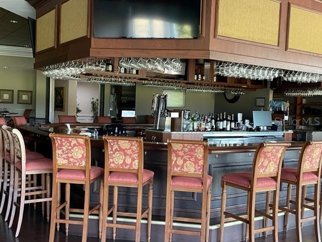 6505 Stone River Road, Unit 202 Bradenton, FL 34203 - Photo 46 of 55 a view of a cafe with outdoor seating