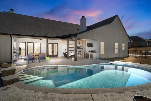 a view of a living room and kitchen