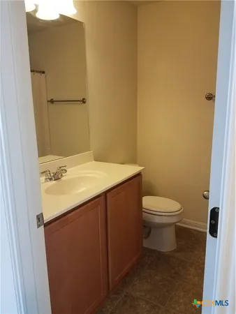a bathroom with a sink and a toilet