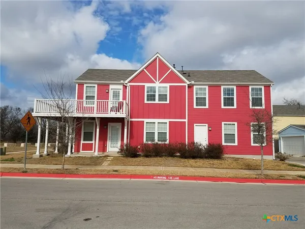 a front view of multi story residential apartment building