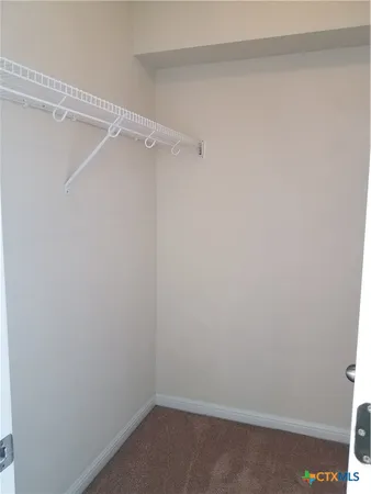 an empty room with a bathroom