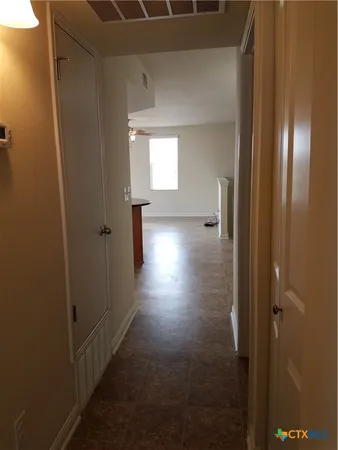 a view of deck with a table and chairs