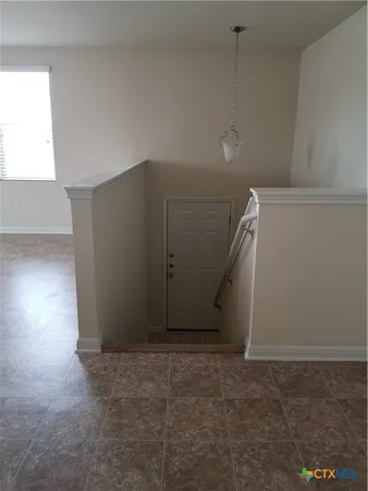 a view of empty room with window