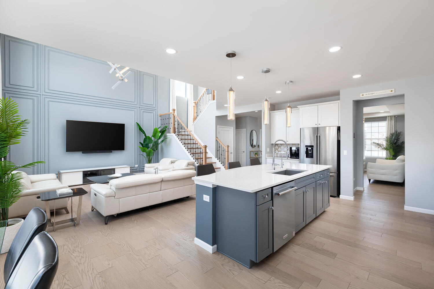 1127 Hibbard Road Naperville, IL 60563 - Photo 13 of 84 a large living room with stainless steel appliances kitchen island granite countertop a couch and a view of living room