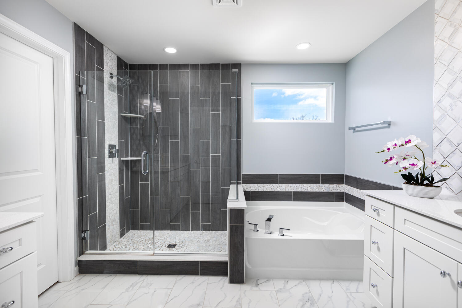 1127 Hibbard Road Naperville, IL 60563 - Photo 36 of 84 a bathroom with a bathtub and a shower