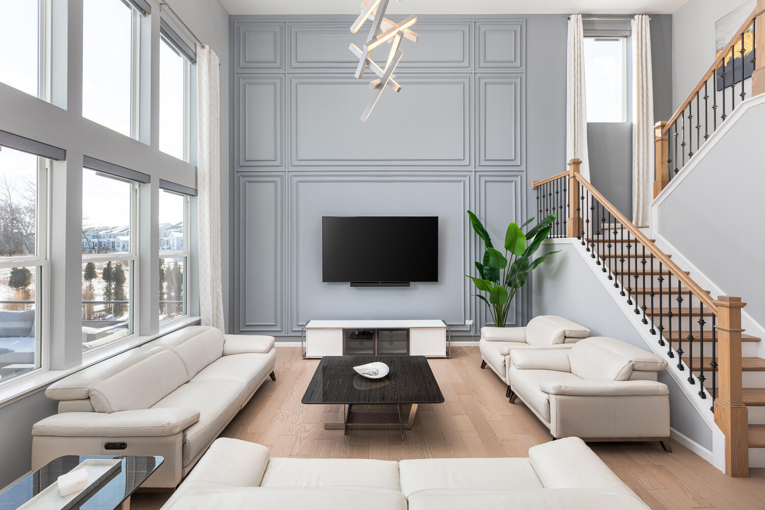 1127 Hibbard Road Naperville, IL 60563 - Photo 7 of 84 a living room with furniture a flat screen tv and a fireplace