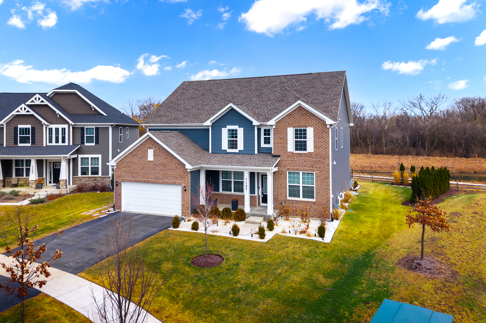 1127 Hibbard Road Naperville, IL 60563 - Photo 75 of 84 a front view of a house with swimming pool having outdoor seating