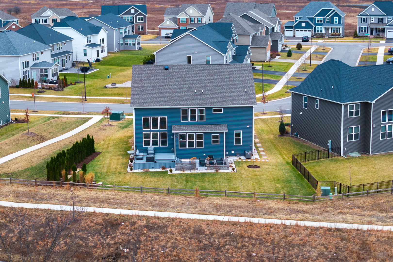 1127 Hibbard Road Naperville, IL 60563 - Photo 79 of 84 a view of a house with a swimming pool