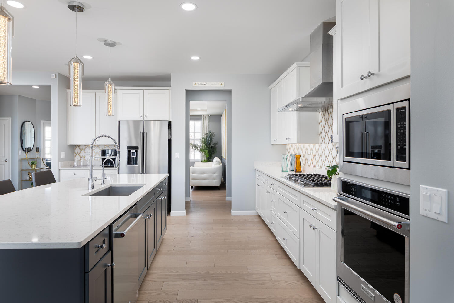 1127 Hibbard Road Naperville, IL 60563 - Photo 9 of 84 a large kitchen with stainless steel appliances kitchen island granite countertop a sink and cabinets
