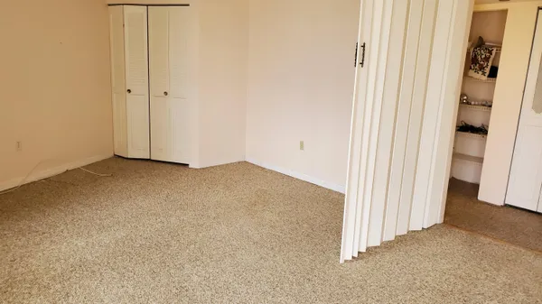 a view of a room with an empty space