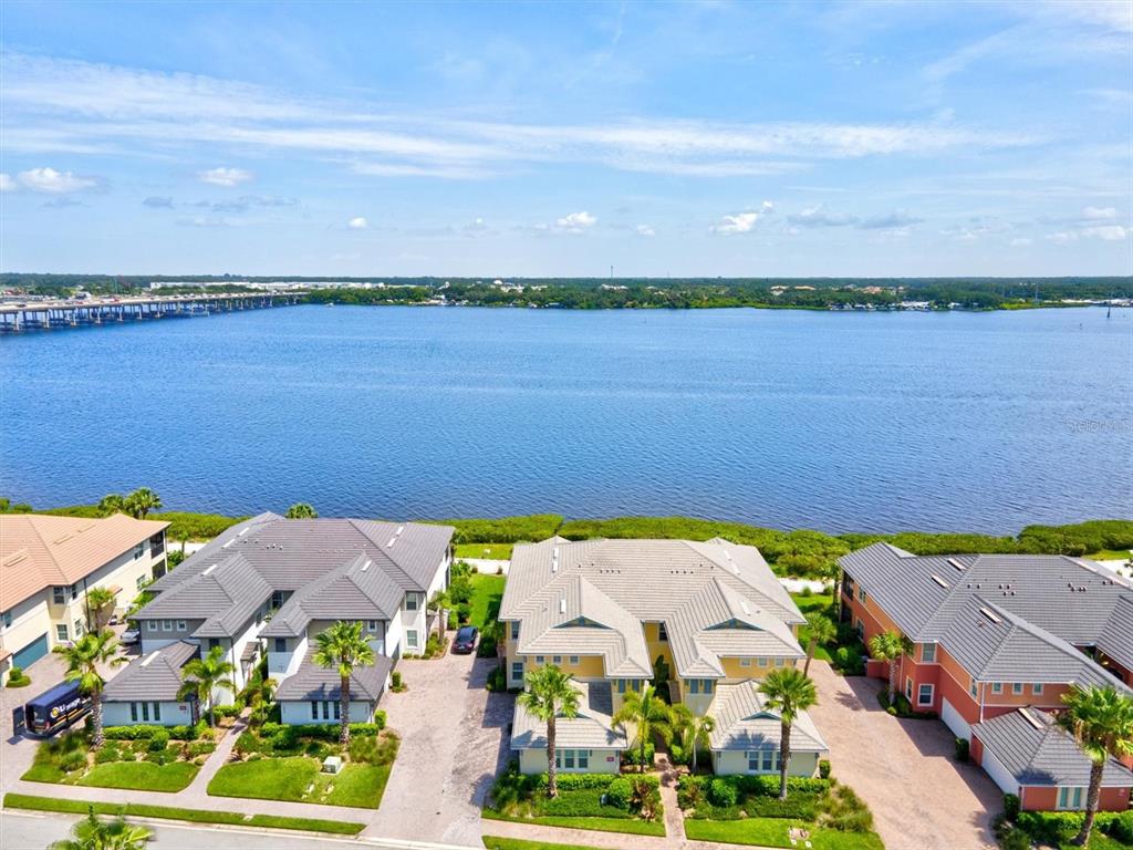 1258 Riverscape Street, Unit 1258 Bradenton, FL 34208 - Photo 1 of 1 an aerial view of houses with yard