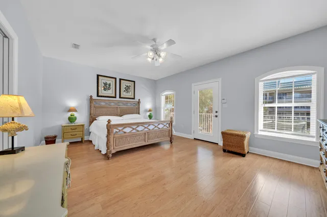 a bathroom with a double vanity sink mirror and shower