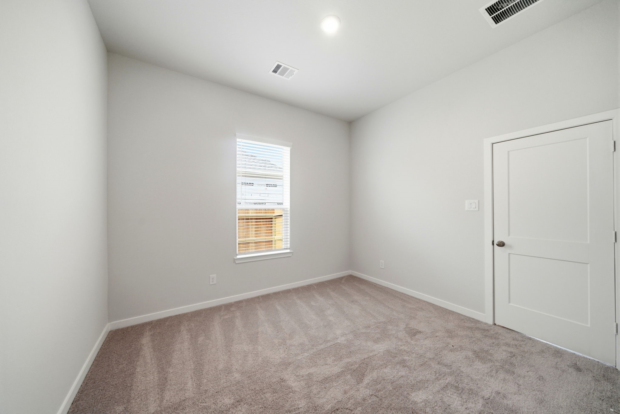 1593 Elm Place Angleton, TX 77515 - Photo 11 of 31 an empty room with a window