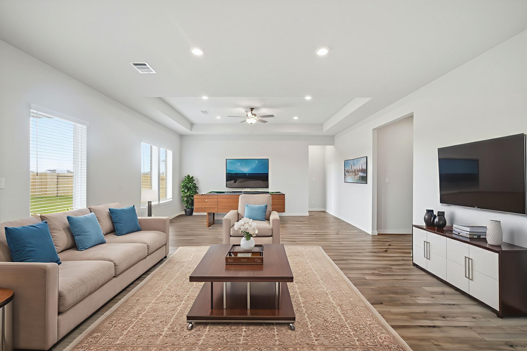 1593 Elm Place Angleton, TX 77515 - Photo 16 of 31 a living room with furniture and a flat screen tv