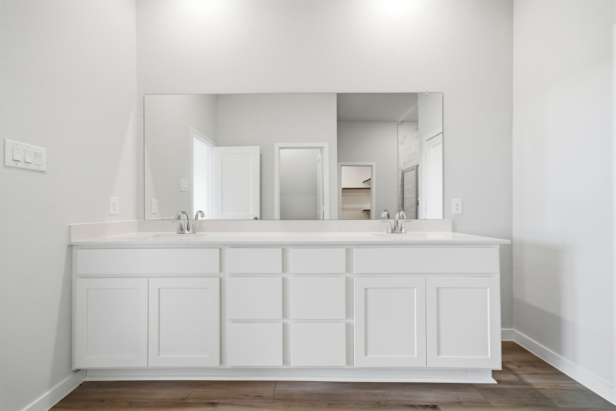 1593 Elm Place Angleton, TX 77515 - Photo 24 of 31 a bathroom with a sink and a mirror