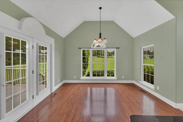 a kitchen with stainless steel appliances a stove a sink and a refrigerator