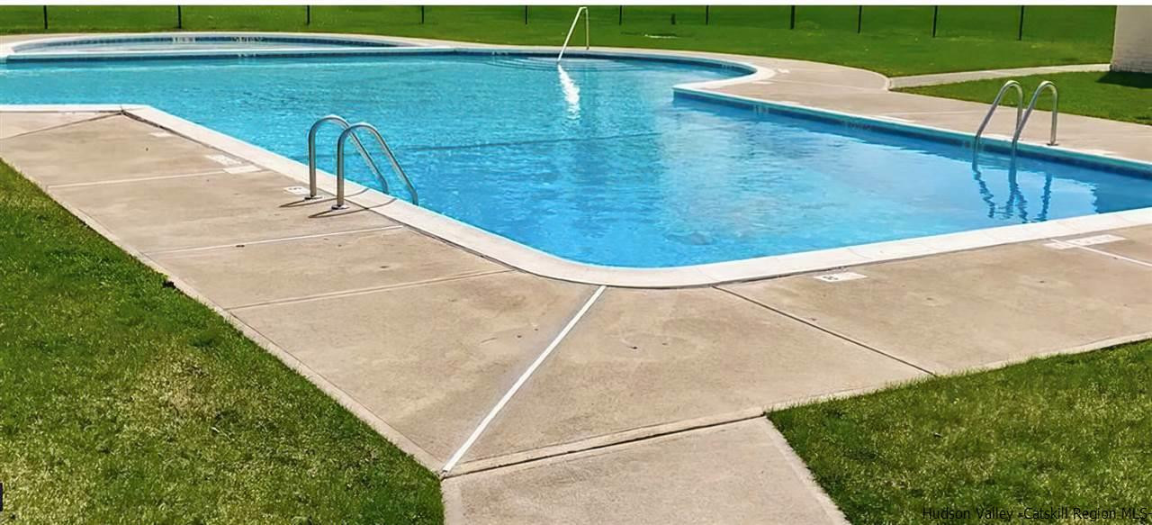 7 White Gate Road, Unit C Wappingers Falls, NY 12590 - Photo 2 of 6 a view of a swimming pool with a outdoor seating