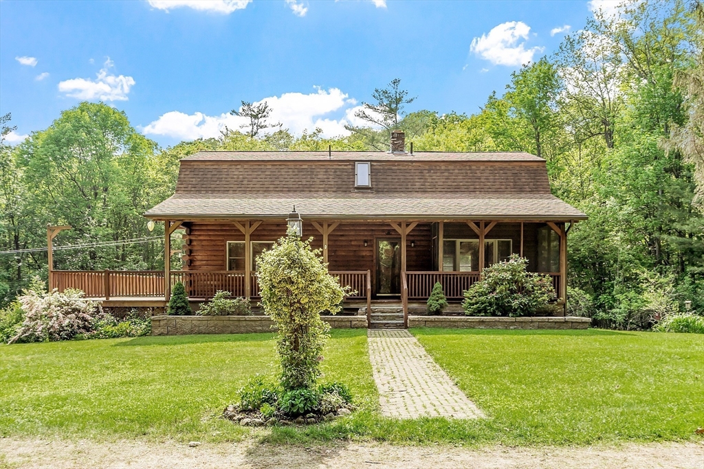 40 Lombard Road Hubbardston, MA 01452 - Photo 1 of 41 a front view of a house with garden