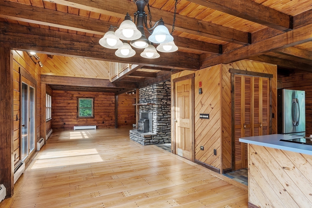 40 Lombard Road Hubbardston, MA 01452 - Photo 14 of 41 a view of a room with wooden floor and windows