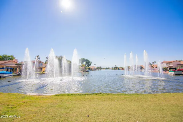 a view of a swimming pool with an ocean view