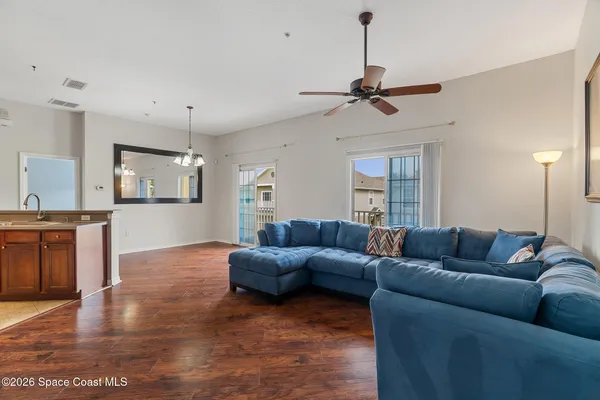 a kitchen with stainless steel appliances granite countertop a refrigerator sink and cabinets