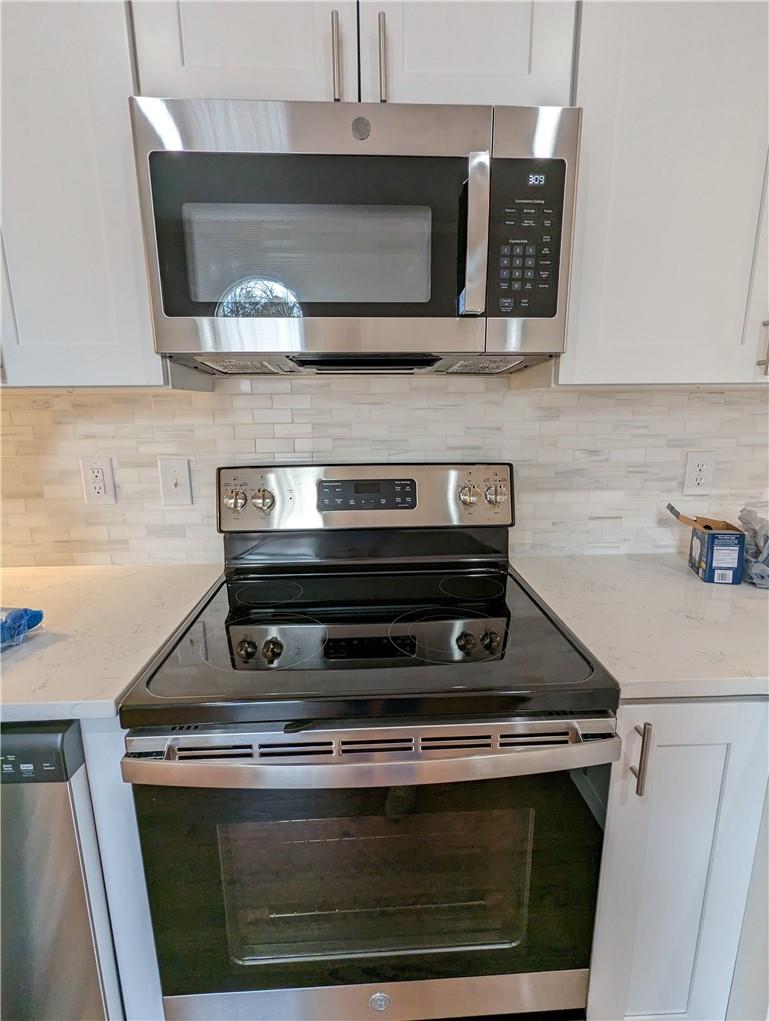 2619 Hinson Road Monroe, NC 28112 - Photo 11 of 39 a stove top oven sitting inside of a kitchen