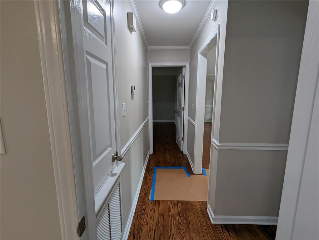 2619 Hinson Road Monroe, NC 28112 - Photo 21 of 39 a view of a hallway with wooden floor and staircase