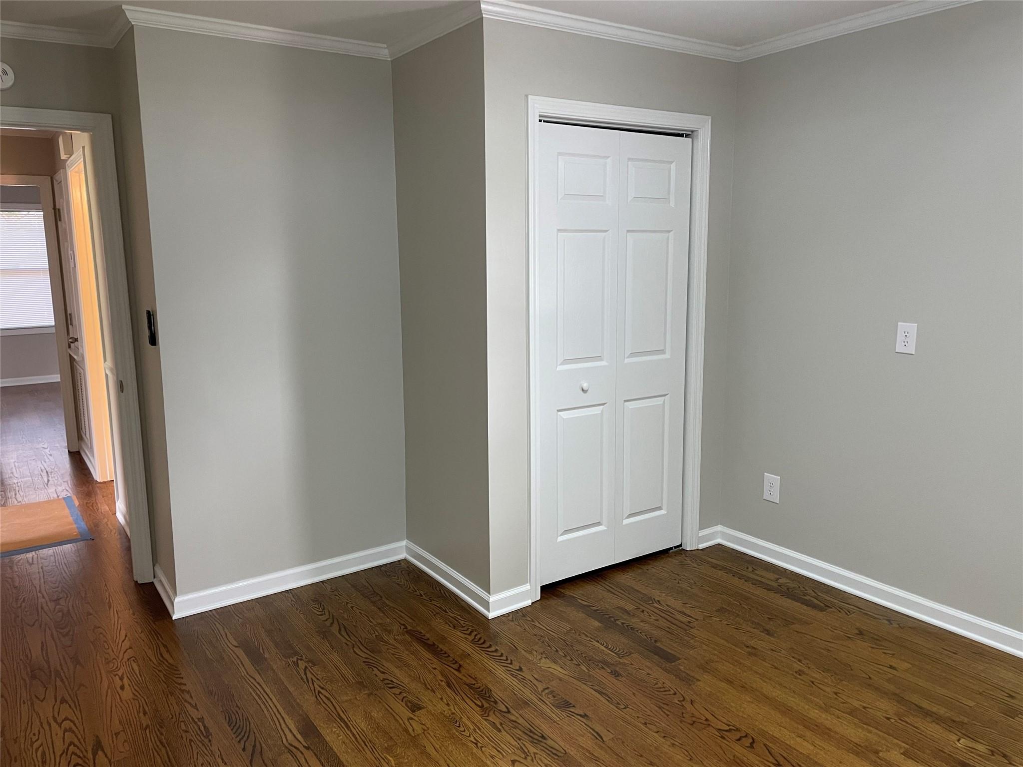 2619 Hinson Road Monroe, NC 28112 - Photo 22 of 39 an empty room with wooden floor and entrance