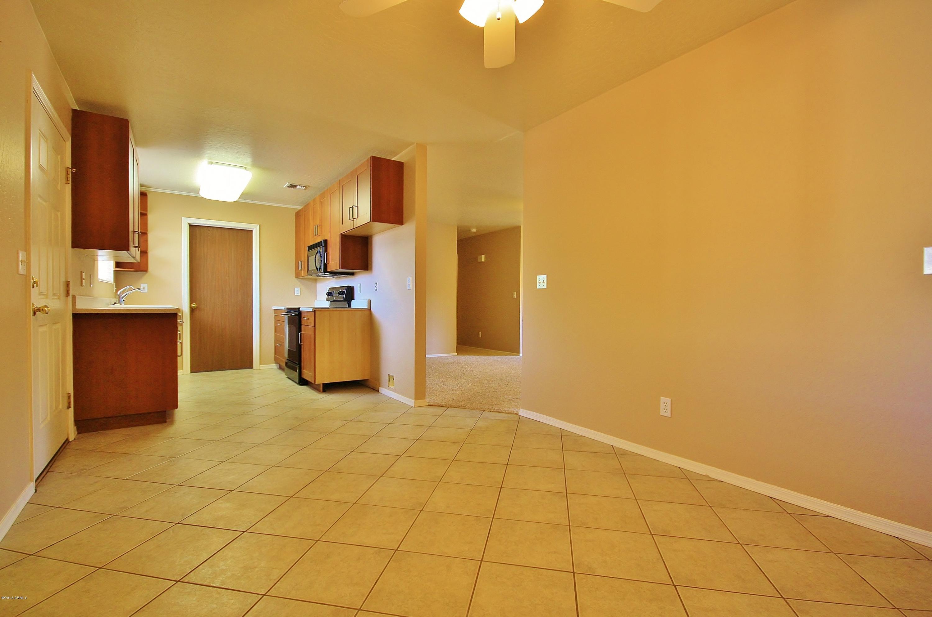 122 North Signal Butte Road Apache Junction, AZ 85120 - Photo 5 of 21 DINING AREA / REMODELED KITCHEN