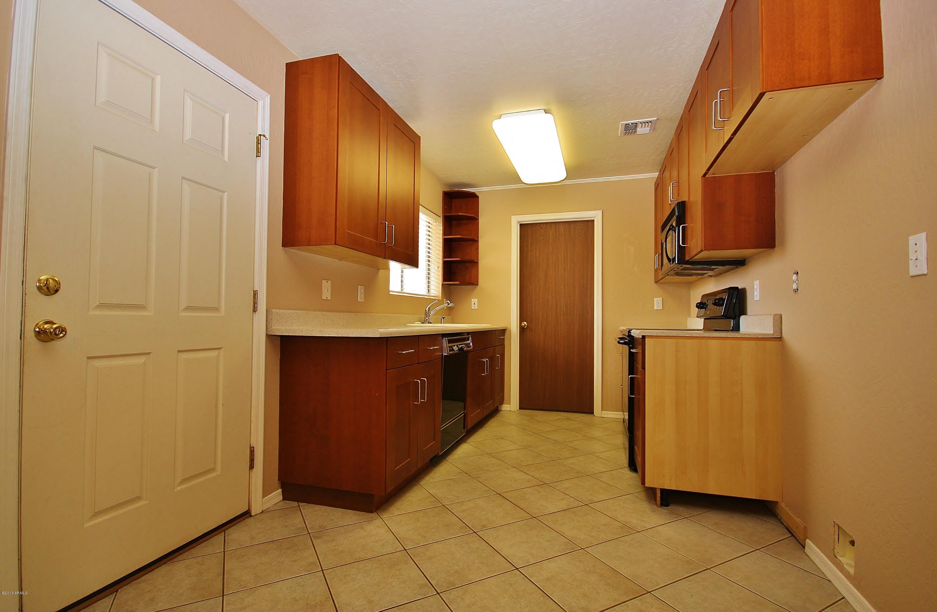 122 North Signal Butte Road Apache Junction, AZ 85120 - Photo 7 of 21 REMODELED KITCHEN