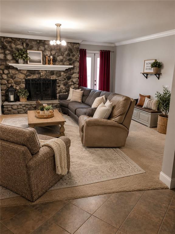 392 Nickelsville Road Northeast Resaca, GA 30735 - Photo 13 of 14 a living room with furniture and a fireplace
