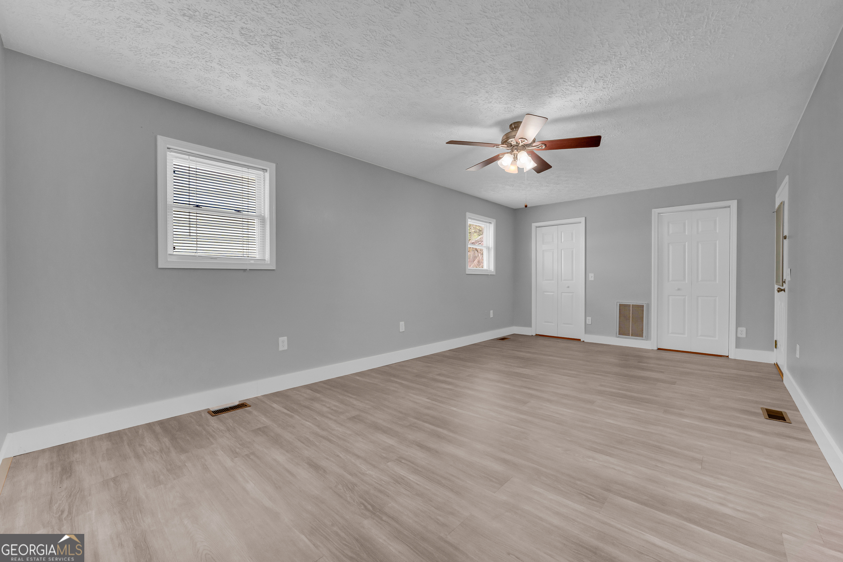 99 Parker Street Carnesville, GA 30521 - Photo 53 of 62 This is the room that could be used as an office, bedroom, exercise room - or maybe as a formal dining room.