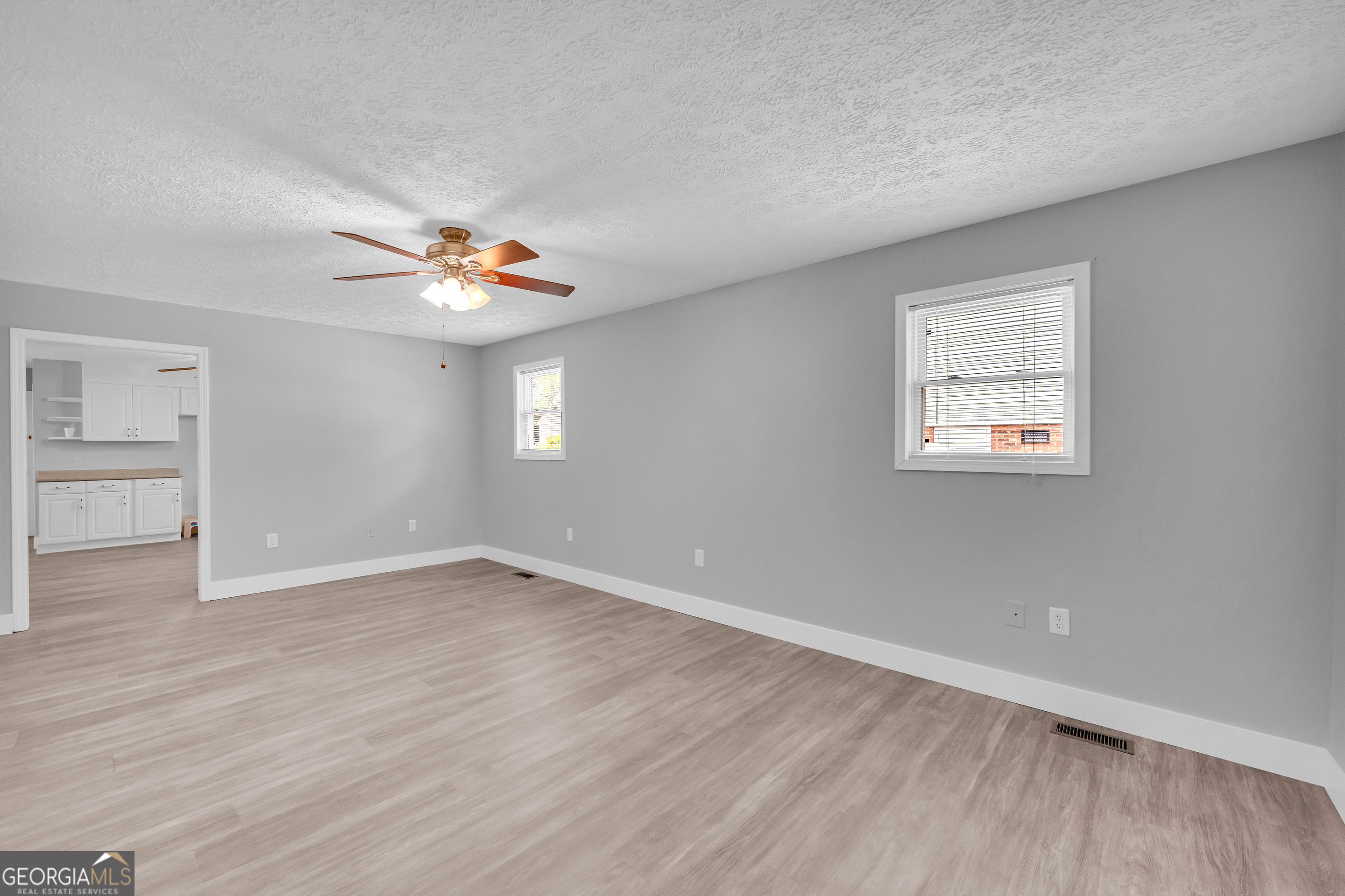 99 Parker Street Carnesville, GA 30521 - Photo 56 of 62 This is the room that could be used as an office, bedroom, exercise room - or maybe a formal dining room.
