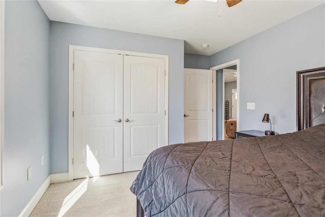 745 Dave Nix Road Seneca, SC 29678 - Photo 16 of 23 Natural light illuminates this comfortable bedroom featuring plush carpeting and a large double-door closet.