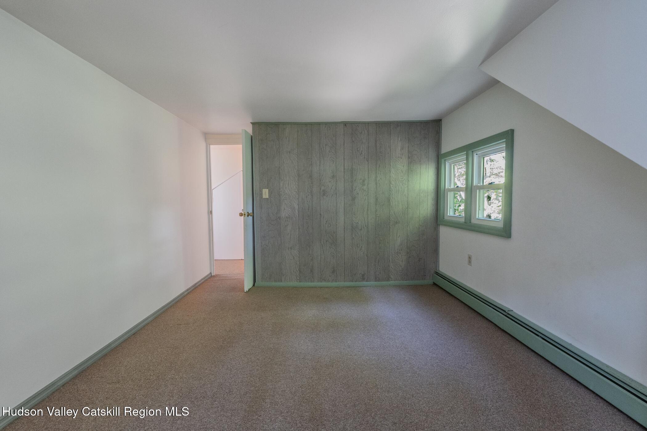 4533 Atwood Road Stone Ridge, NY 12484 - Photo 38 of 63 a view of an empty room with a window