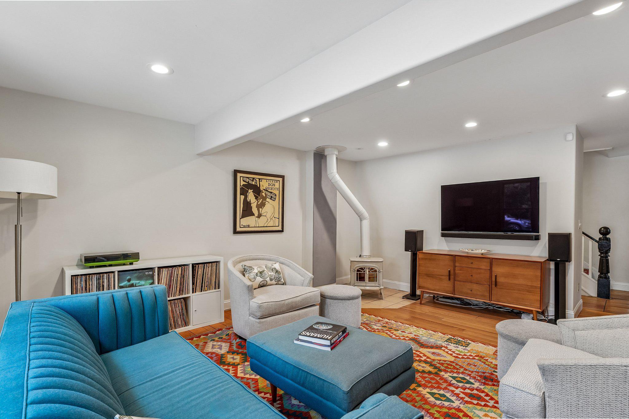 5716 Rusk Avenue Baltimore, MD 21215 - Photo 11 of 48 Living Room w/ Wood Stove