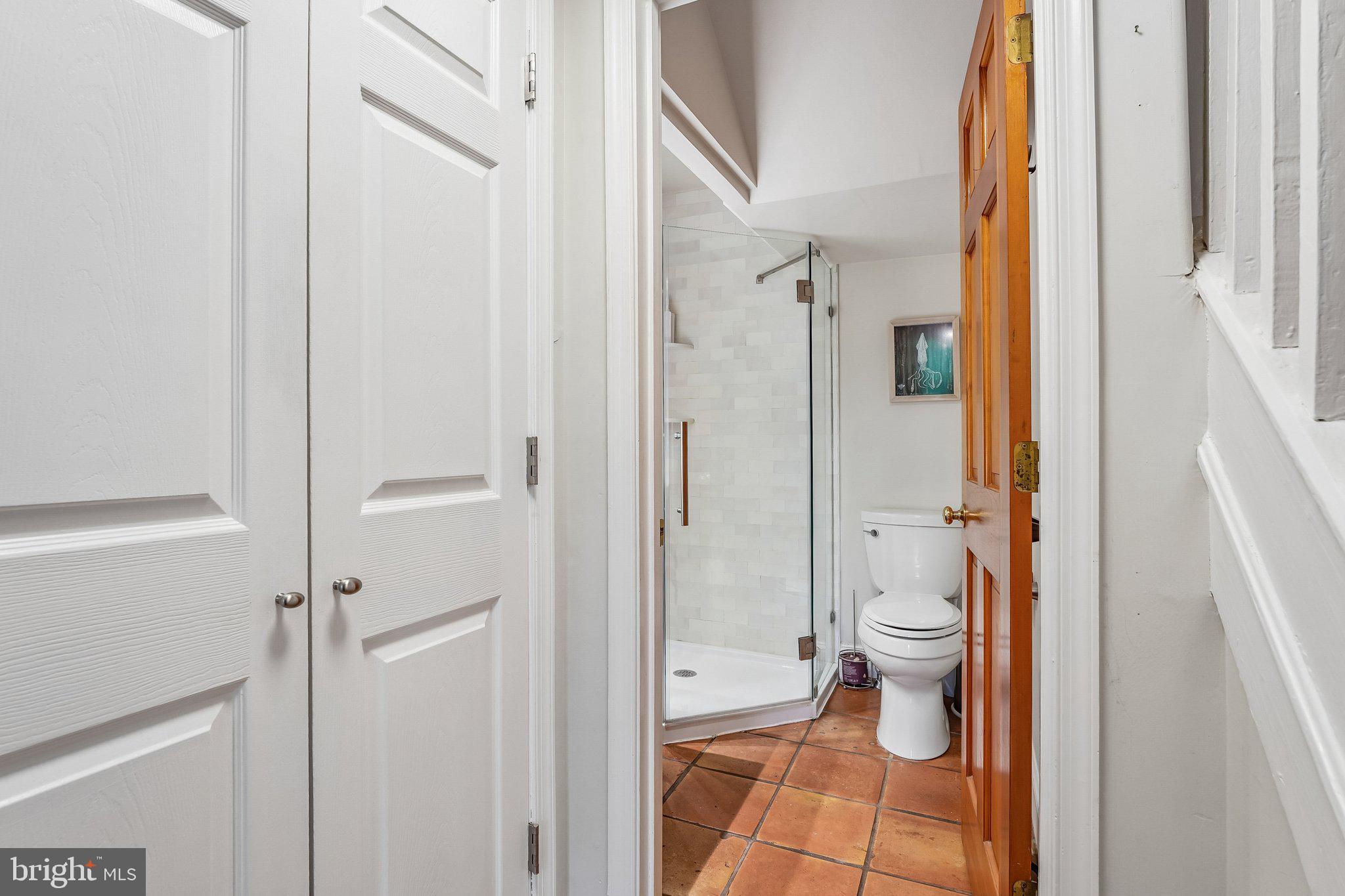 5716 Rusk Avenue Baltimore, MD 21215 - Photo 13 of 48 Main floor coat closet and full bath