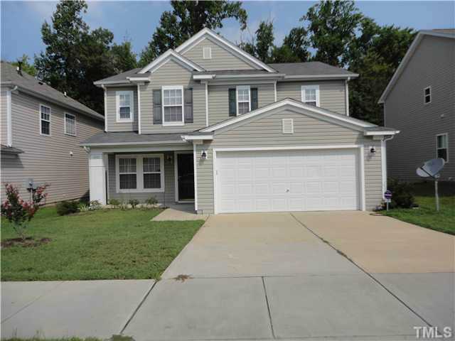 5955 Ricker Road Raleigh, NC 27610 - Photo 1 of 20 front view of a house with a yard