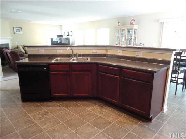 5955 Ricker Road Raleigh, NC 27610 - Photo 10 of 20 a view of a sink and cabinets
